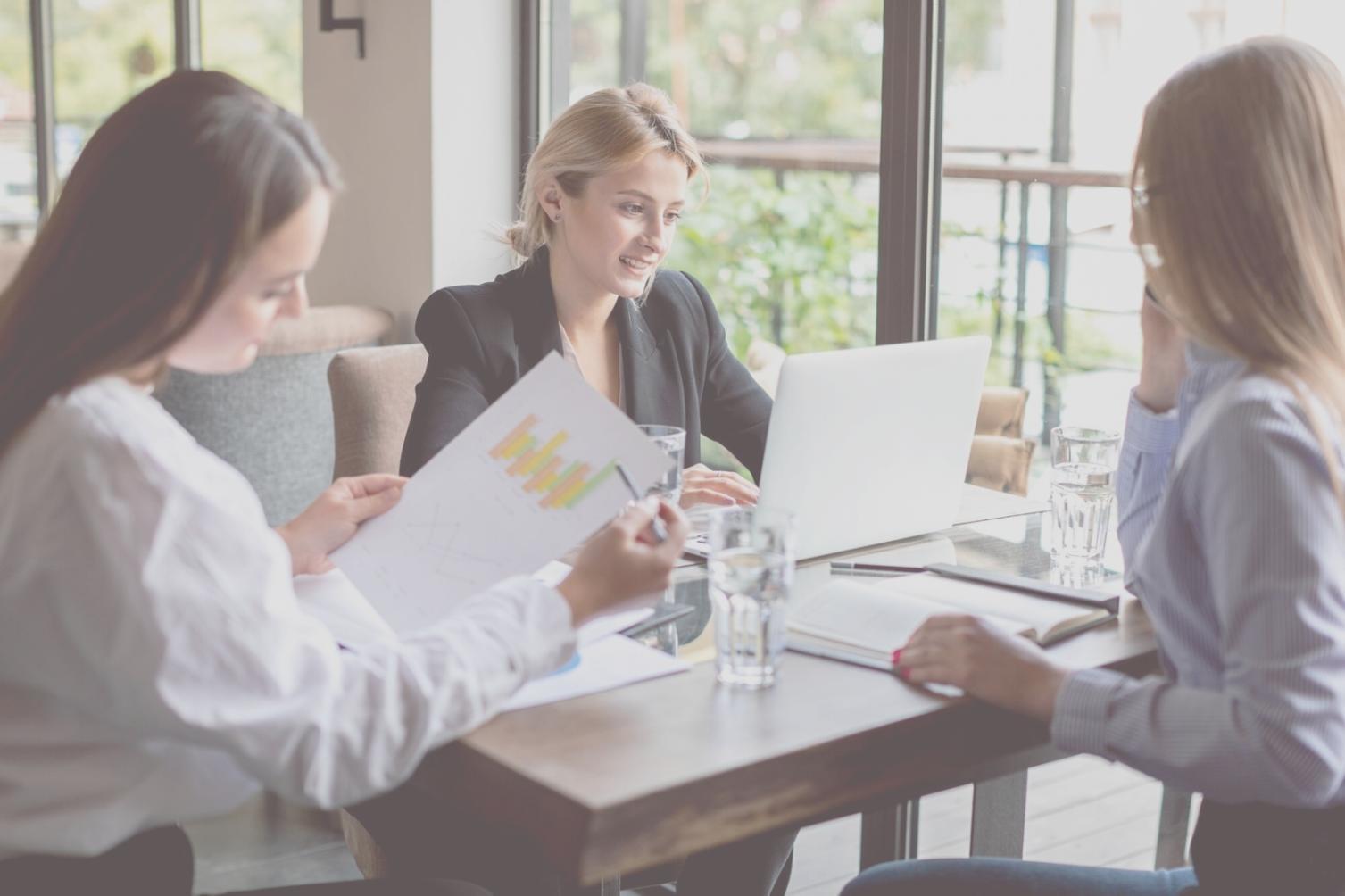 Business owner implementing new budgeting system at desk